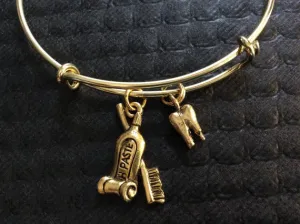 Gold Tooth and Toothbrush and Toothpaste Charm on an Expandable Adjustable Bangle Bracelet Dentist or DH Dental Hygenist Gift