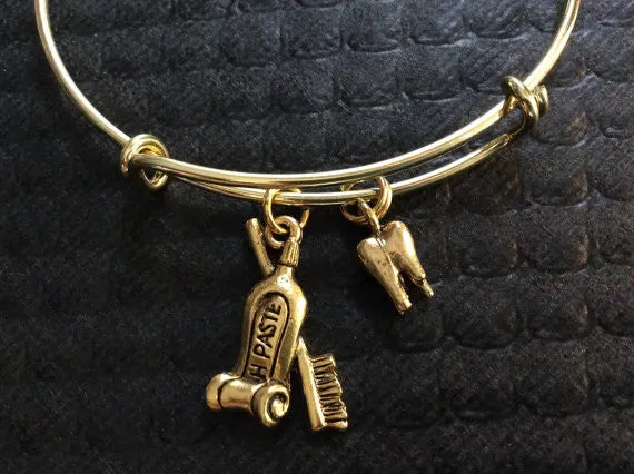 Gold Tooth and Toothbrush and Toothpaste Charm on an Expandable Adjustable Bangle Bracelet Dentist or DH Dental Hygenist Gift